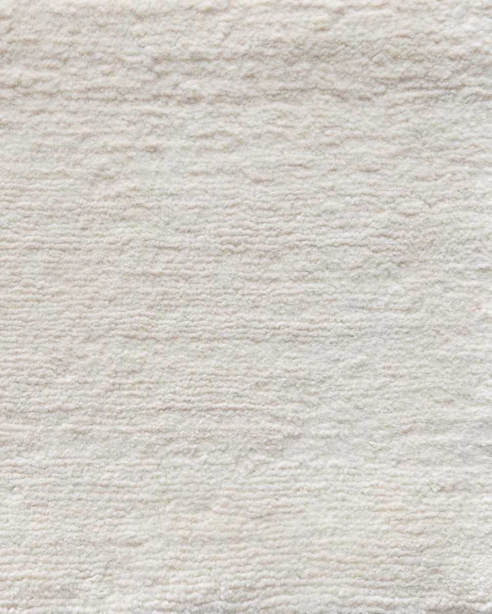 Handtufted alpaca cream colored textural rug