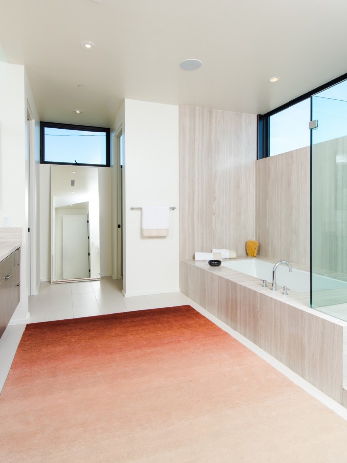 Transitional Rug Fade displayed in large bathroom space with a tub 
