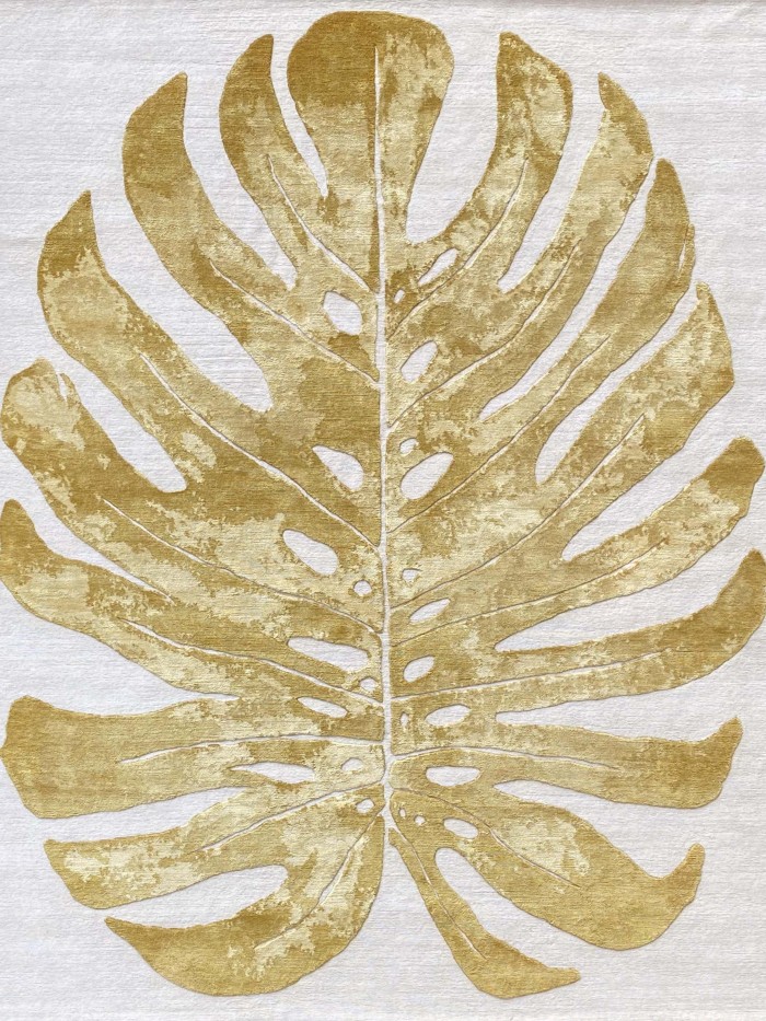 Monstera leaf  gold and cream wool rug botanical leaf 